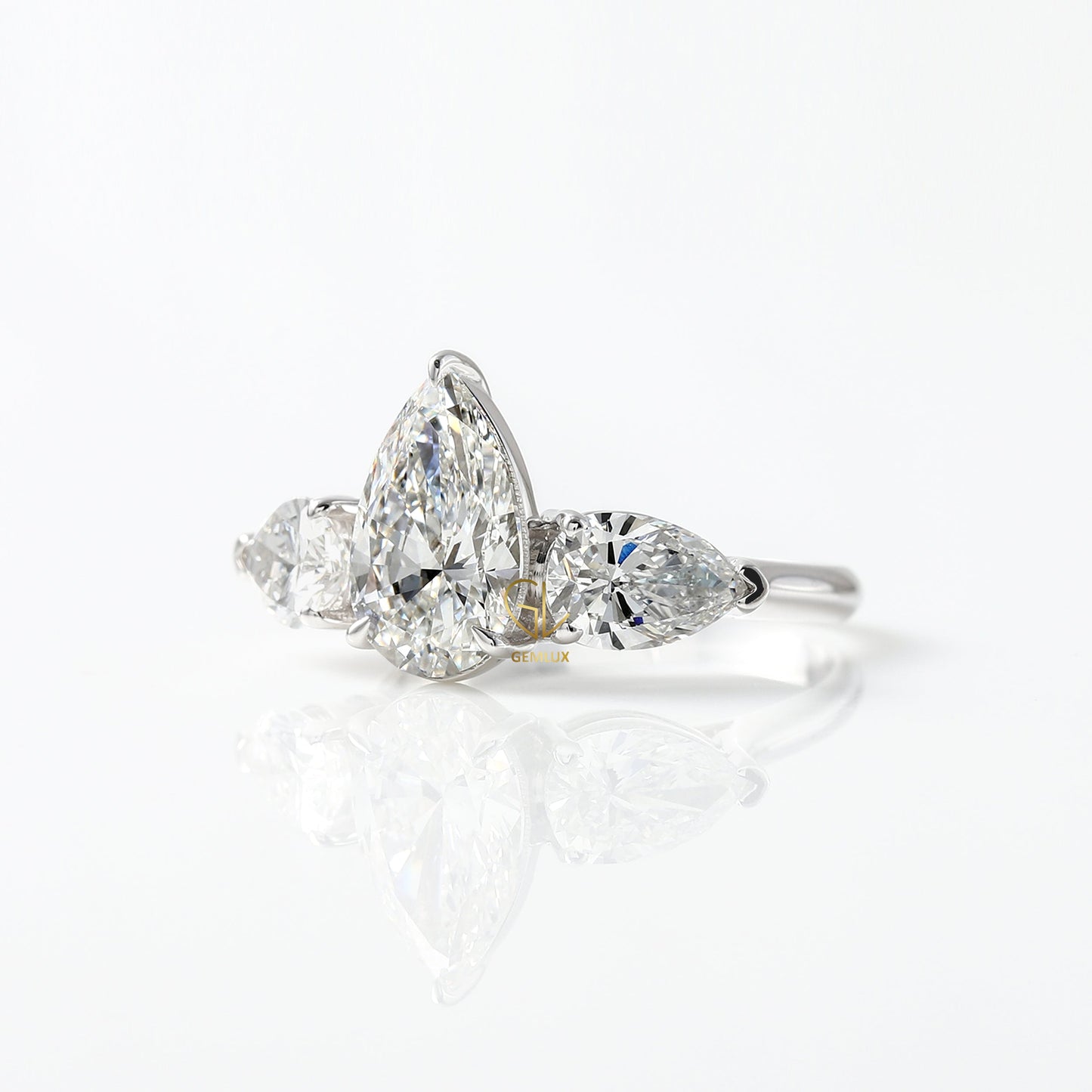 3 Ct Pear Cut Lab Grown Diamond Three Stone Ring