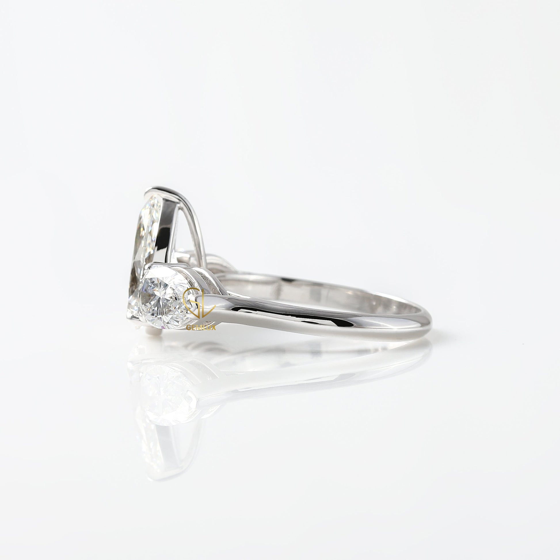 3 Ct Pear Cut Lab Grown Diamond Three Stone Ring