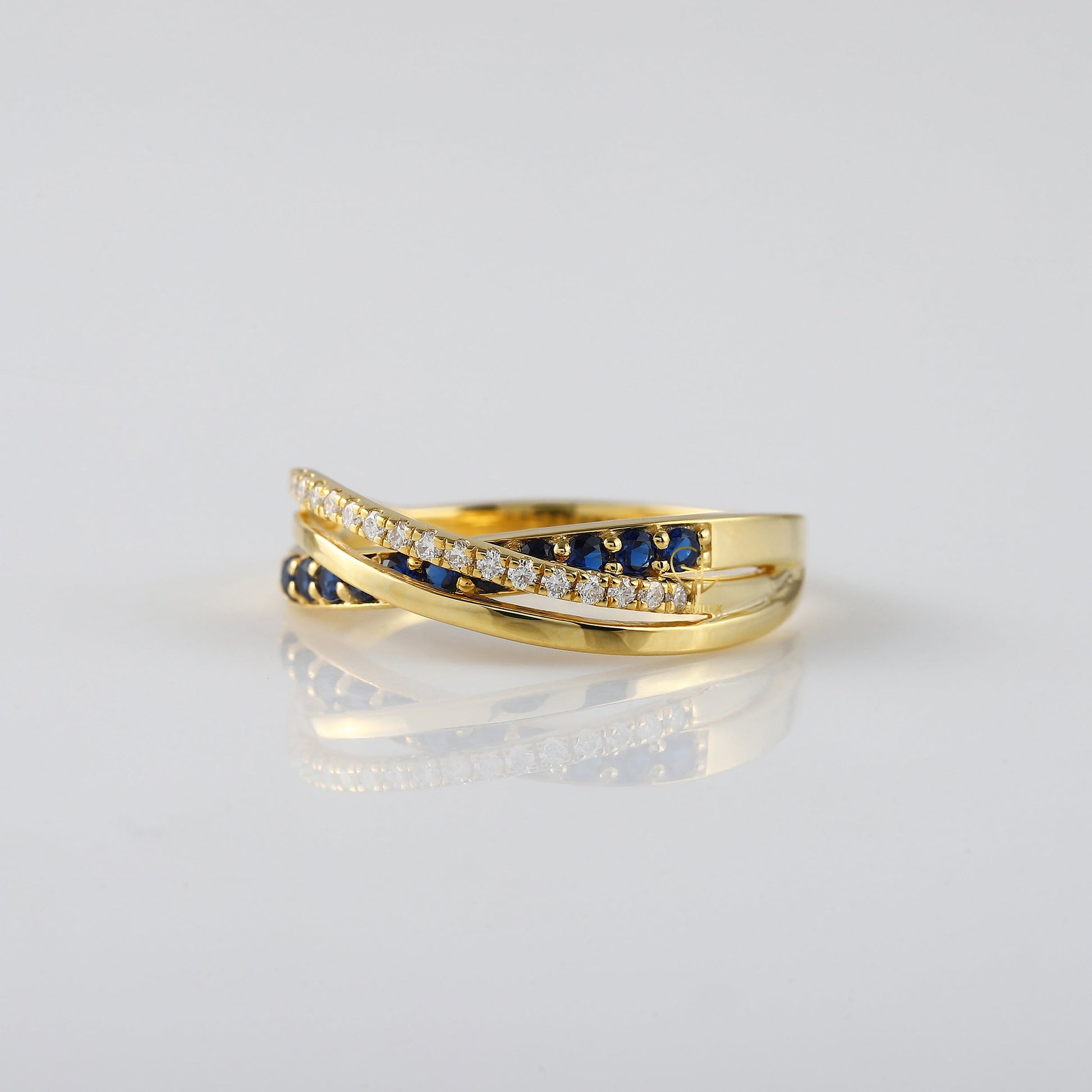 Criss Cross Blue Sapphire Moissanite Engagement Ring