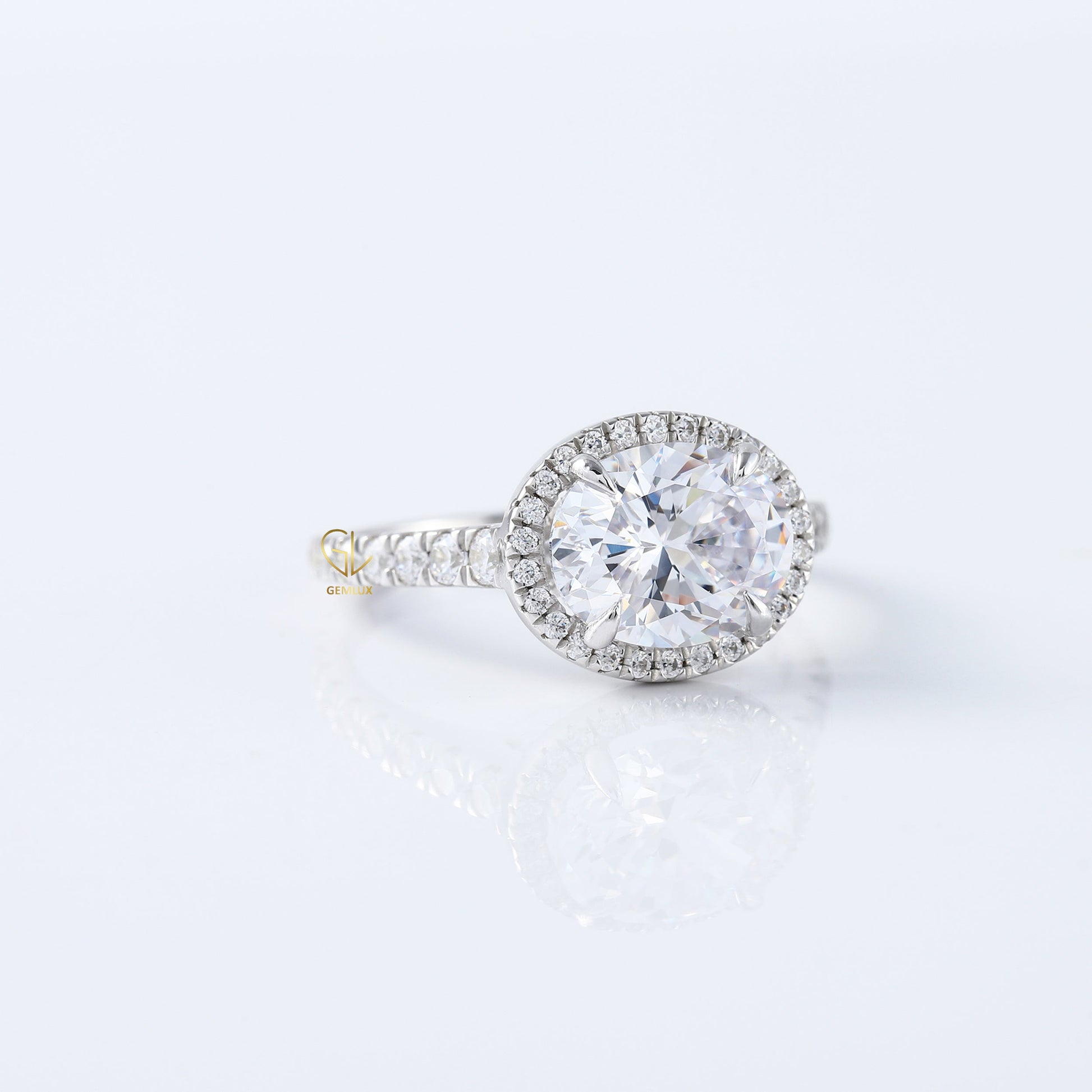 East West Oval Cut Lab Grown Halo Engagement Ring