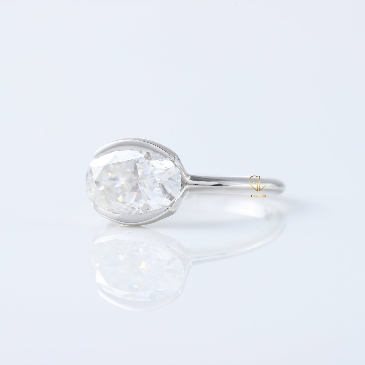 East West Oval Lab Grown Diamond Solitaire Ring - Half Bezel