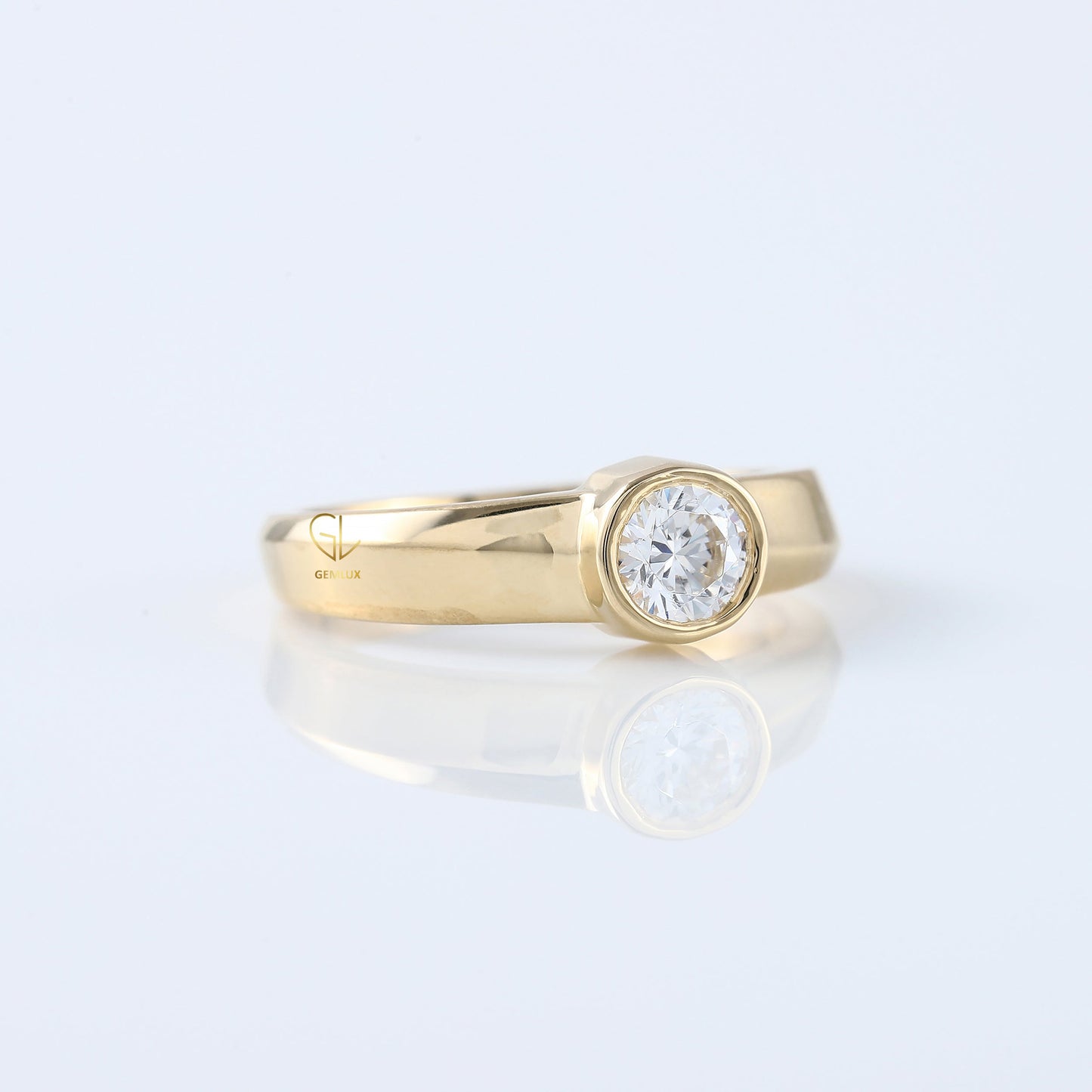 Bezel Set Round Moissanite Solitaire Yellow Gold Ring