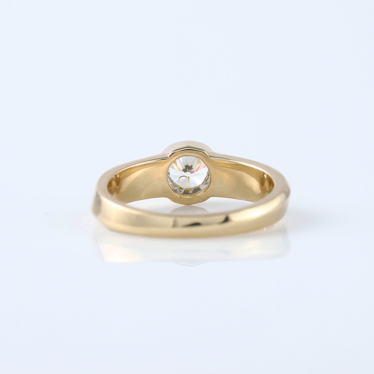 Bezel Set Round Moissanite Solitaire Yellow Gold Ring