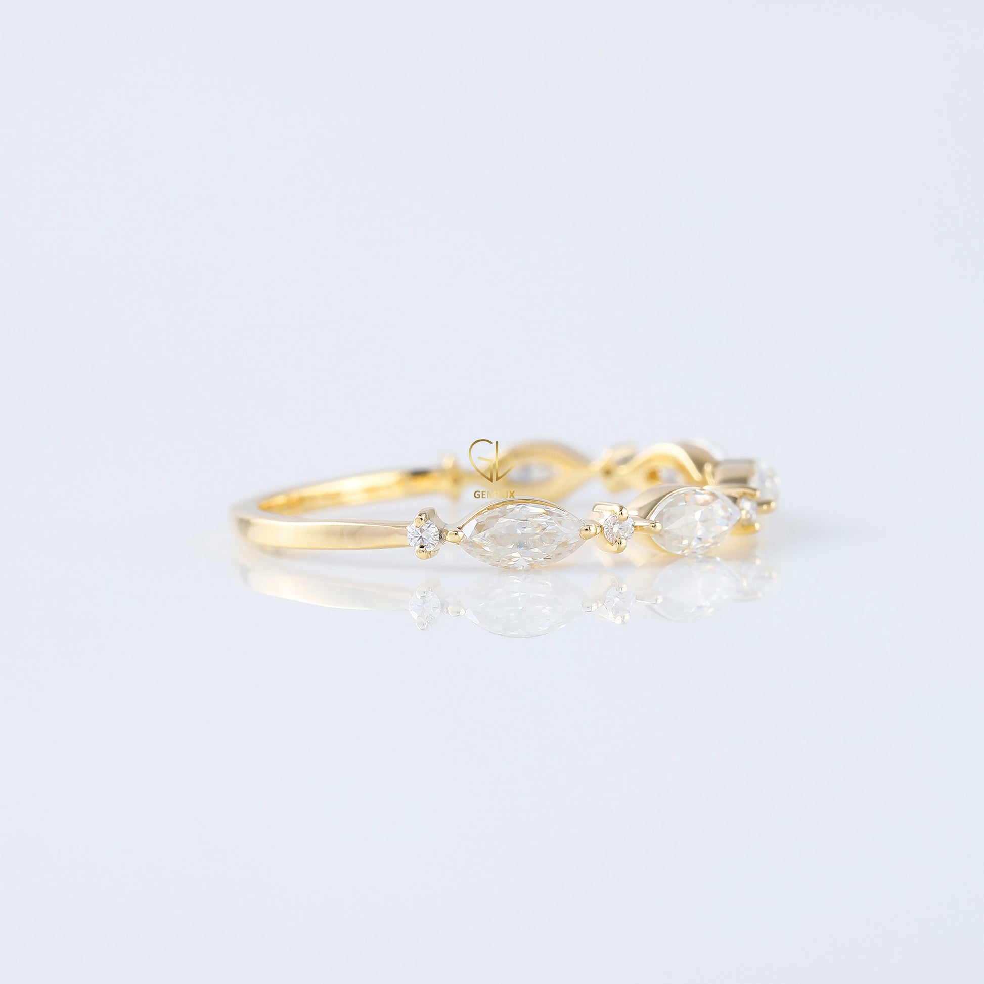 minimalist band, alternative stone eternity band, marquise and round moissanite matching band, yellow gold eternity wedding band; 
