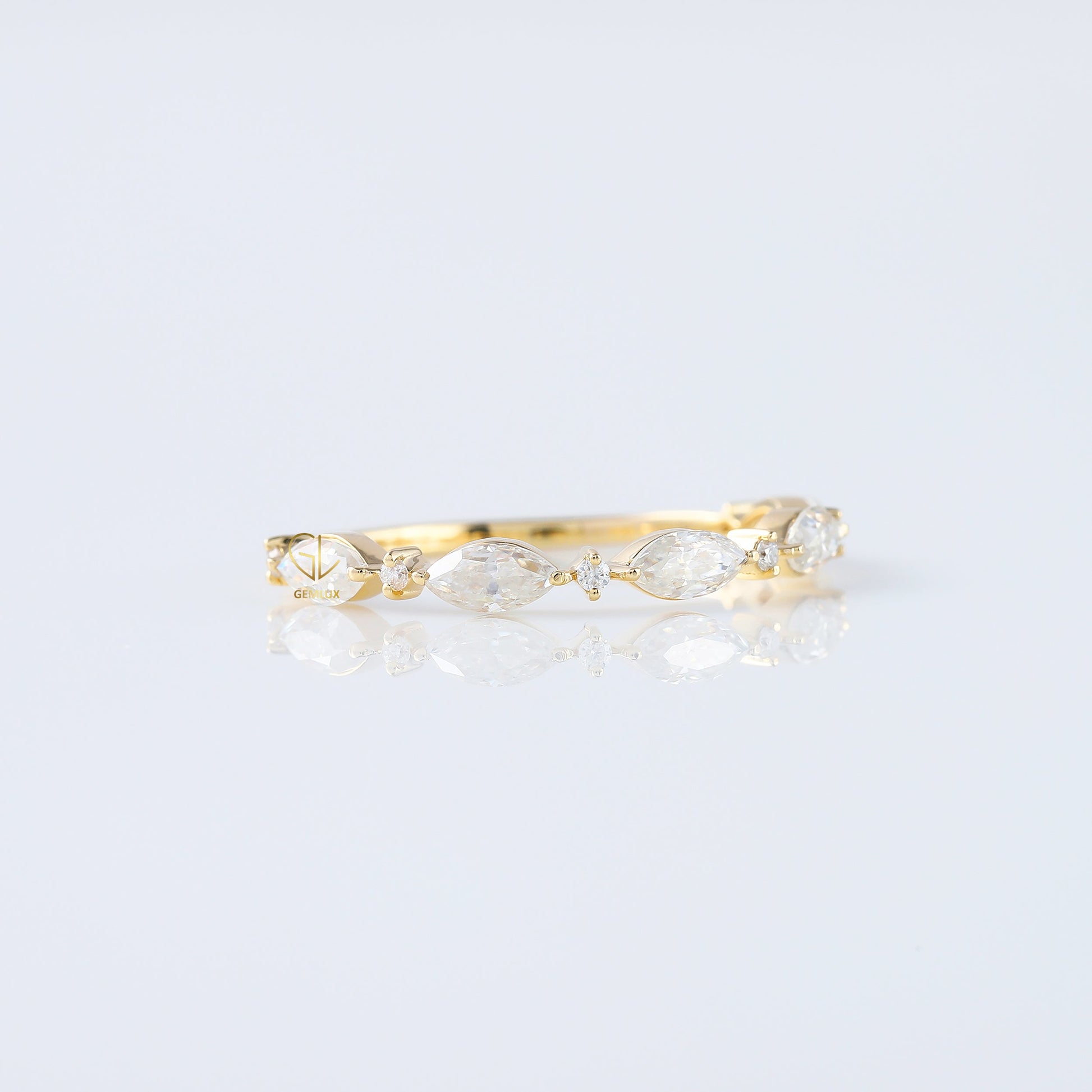 minimalist band, alternative stone eternity band, marquise and round moissanite matching band, yellow gold eternity wedding band; 
