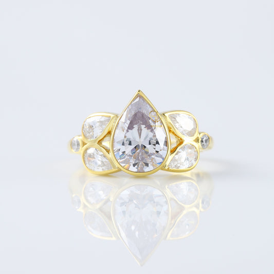 Seven Stone Pear Cut Moissanite Bezel Set Yellow Gold Ring