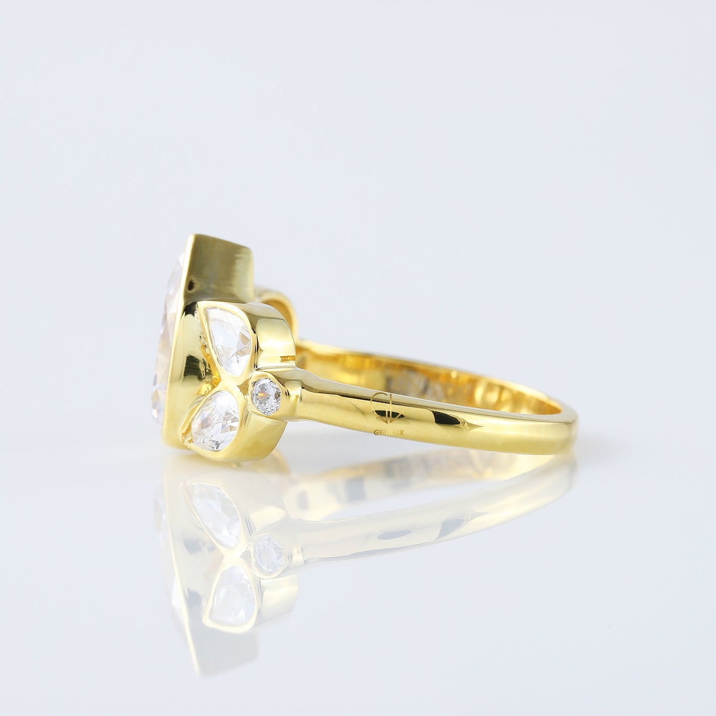 Seven Stone Pear Cut Moissanite Bezel Set Yellow Gold Ring