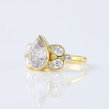 Seven Stone Pear Cut Moissanite Bezel Set Yellow Gold Ring